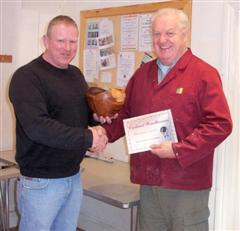 The monthly winner Tony Handford received his certificate from Chris Eagles